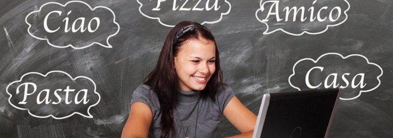 board with Italian words and a smiling girl